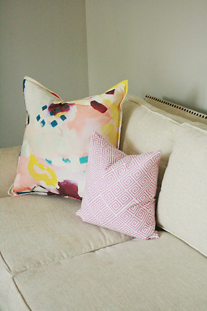 caitlin wilson and britt bass pillows on white sofa