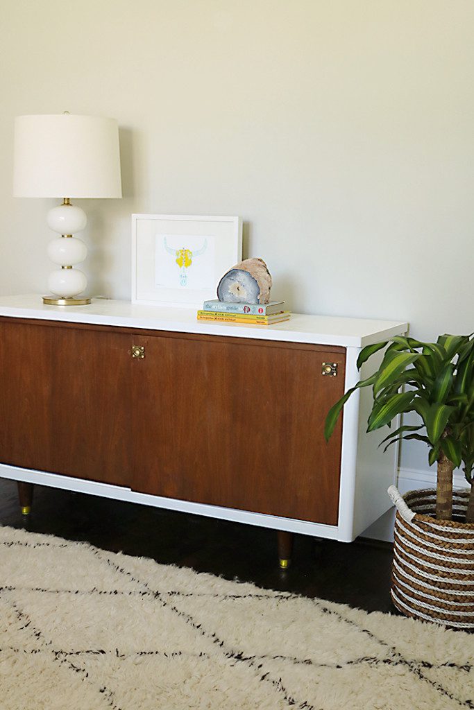 mid century credenza with white shag rug