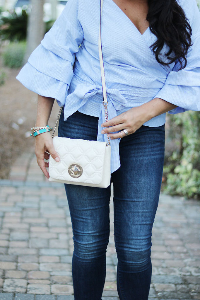 ruffled-shirt-with-quilted-kate-spade-bag, ruffled-sleeve-wrap-shirt-and-jeans, laced heels, shop bop, classy blue on blue outfit styling fall fashion trend 2016, beach style