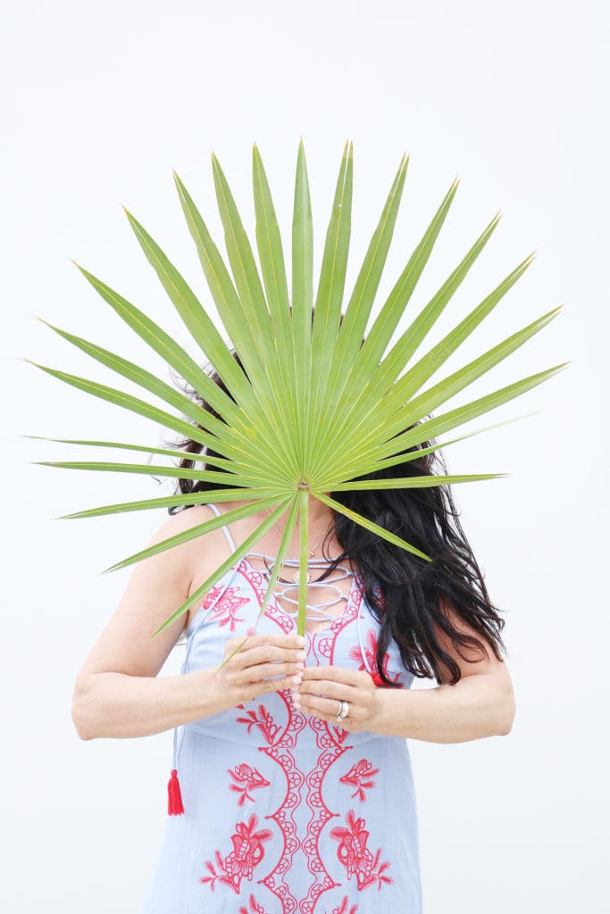 Palm Leaf from Alys Beach Florida wearing a tassel pom embroidery beach vacation maxi dress, beach look, what dress to pack || Darling Darleen