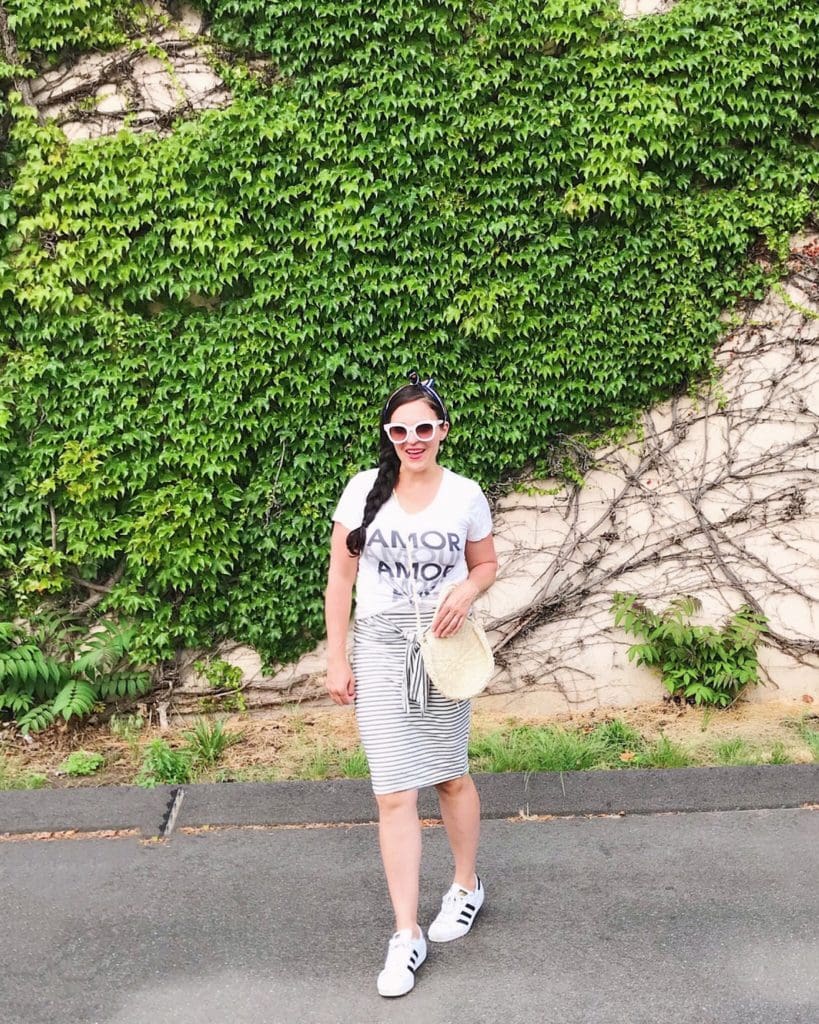 Graphic tee summer trend with skirt, summer outfit idea with Puma sneaker shoes, Saturday day casual outfit day