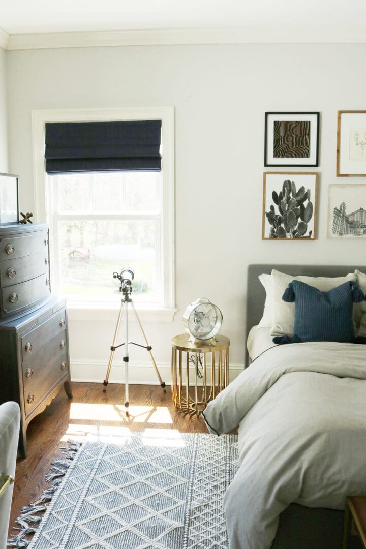 Sharing the reveal of our modern teen boy bedroom that is the perfect transition to a guest bedroom with its subtle colors and simple lines.  Modern line and gallery picture wall of navy and gray || Darling Darleen Top New England Lifestyle Blogger #boybedroom #modernbedroom