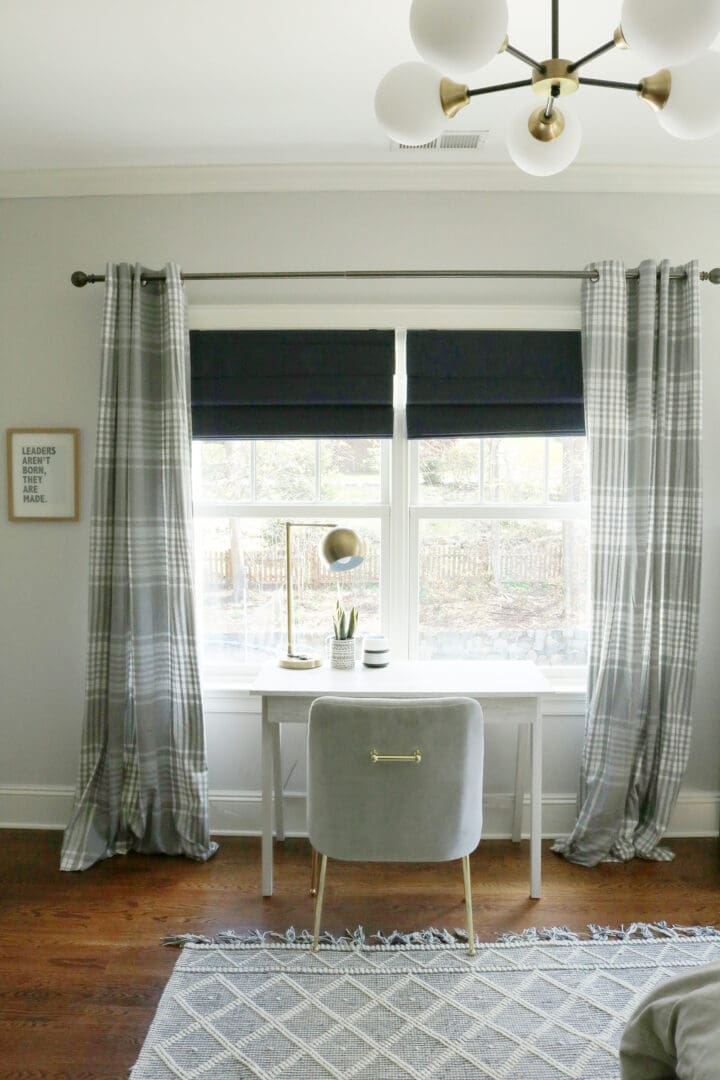 Sharing the reveal of our modern teen boy bedroom that is the perfect transition to a guest bedroom with its subtle colors and simple lines.  Modern line and gallery picture wall of navy and gray || Darling Darleen Top New England Lifestyle Blogger #boybedroom #modernbedroom