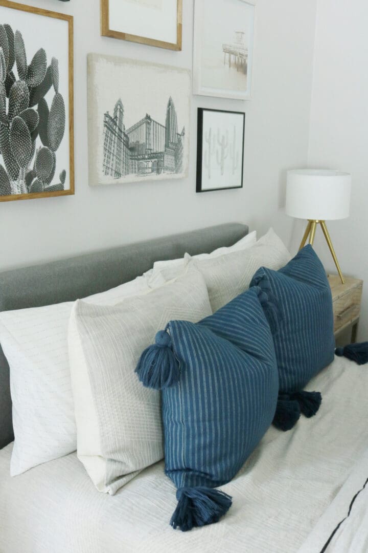 Sharing the reveal of our modern teen boy bedroom that is the perfect transition to a guest bedroom with its subtle colors and simple lines.  Modern line and gallery picture wall of navy and gray || Darling Darleen Top New England Lifestyle Blogger #boybedroom #modernbedroom