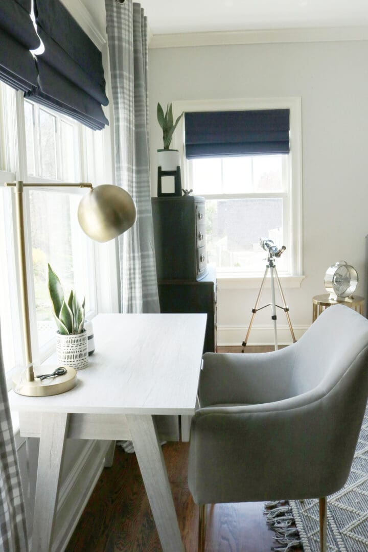 Sharing the reveal of our modern teen boy bedroom that is the perfect transition to a guest bedroom with its subtle colors and simple lines.  Modern line and gallery picture wall of navy and gray || Darling Darleen Top New England Lifestyle Blogger #boybedroom #modernbedroom