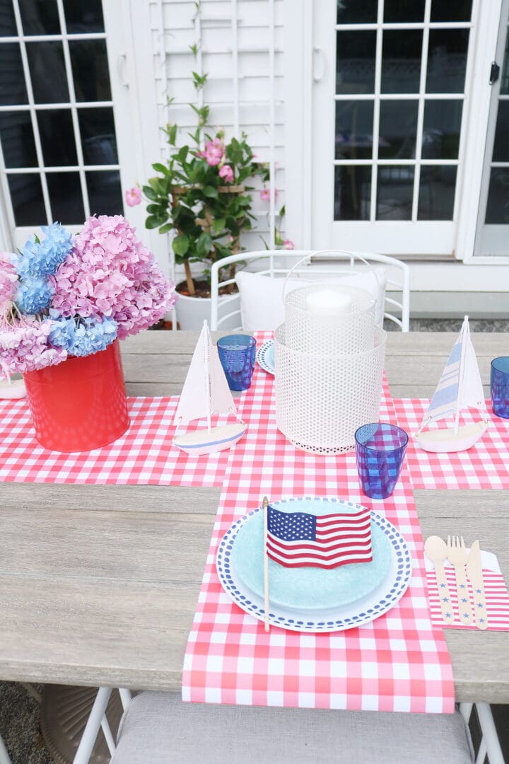 This year host a 4th of July barbecue party and sharing simple budget-friendly decorating tips, 4th of july party decorations, 4th of July outfit, red gingham dress, 4th of July entertaining tips, american flag decorations, backyard party, 4th of july tablescape || Darling Darleen Top CT Lifestyle Blogger #4thofjuly #4thofjulyoutfit