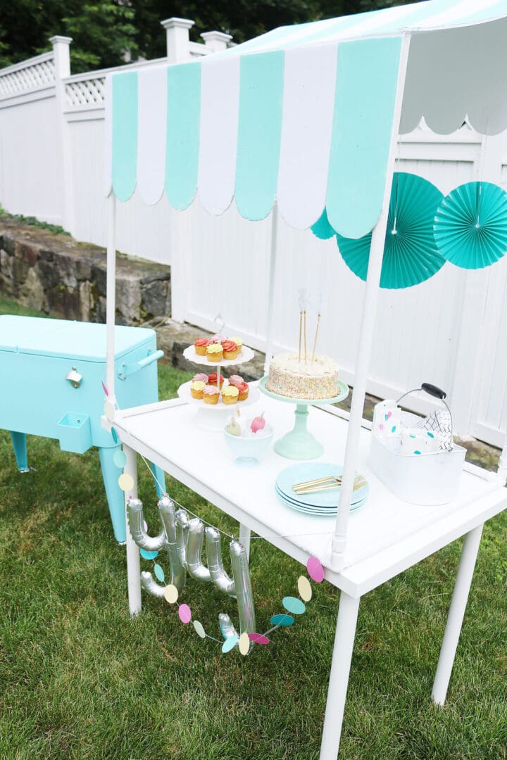 Make this DIY Scallop Table Top for your next lemonade stand or ice cream stand or birthday party!  Giving all the details and the instructions!  || Darling Darleen Top Lifestyle Blogger #darlingdarleen #DIYparty #lemonadestand #icecreamstand #Scallopcanopy