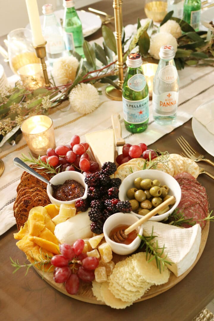 5 Ways to bring the restaurant experience to your home with Acqua Panna and Pellegrino single-serve glass bottles perfect to add the table. cheese board charcuterie board. || Darling Darleen Top Lifestyle Blogger
