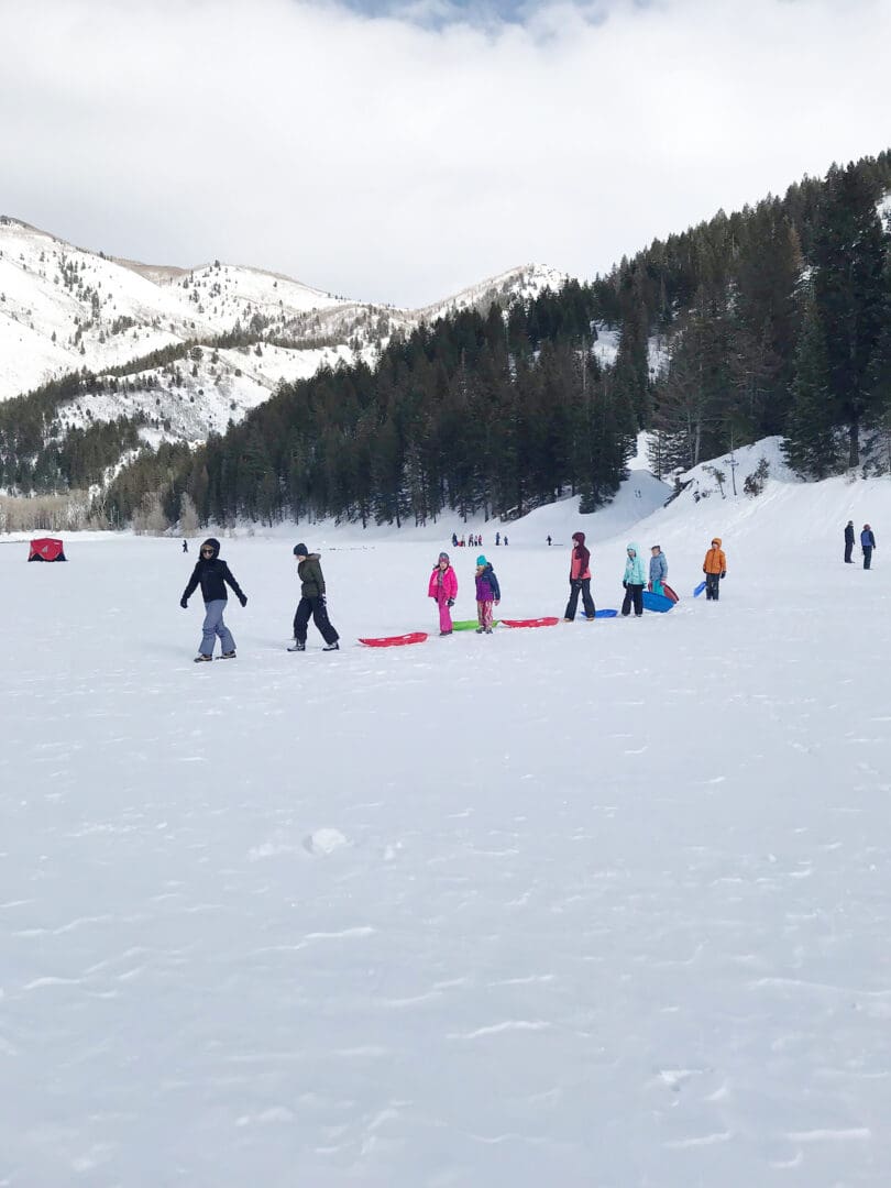 Our Utah Winter Travel Guide is out! Sharing what to Pack and where to Go for a Utah Winter Adventure. Our top 5 winter adventures! Sledding and Hiking Utah Tibble Fork American Fork Utah || Darling Darleen Top CT Lifestyle Blogger  