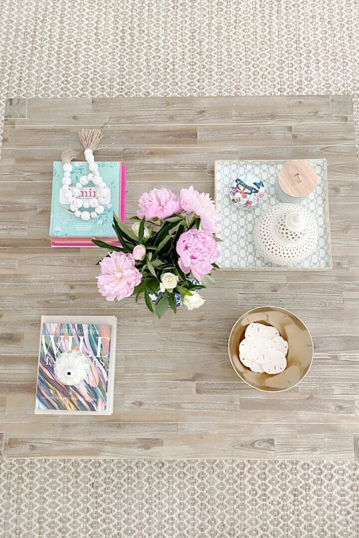 A fun and simple way for coffee table styling and the items you need to have to make it look polished and well put together. || Darling Darleen Top CT Lifestyle Blogger #coffeetablestyling #coffeetable 