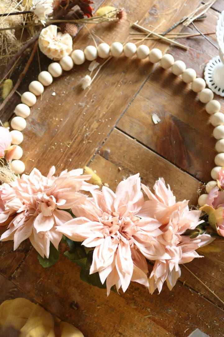 DIY Wooden Bead Fall Wreath with Dried and Faux Flowers for your front door or over a fireplace mantle. The perfect Fall home decor || Darling Darleen Top CT Lifestyle Blogger