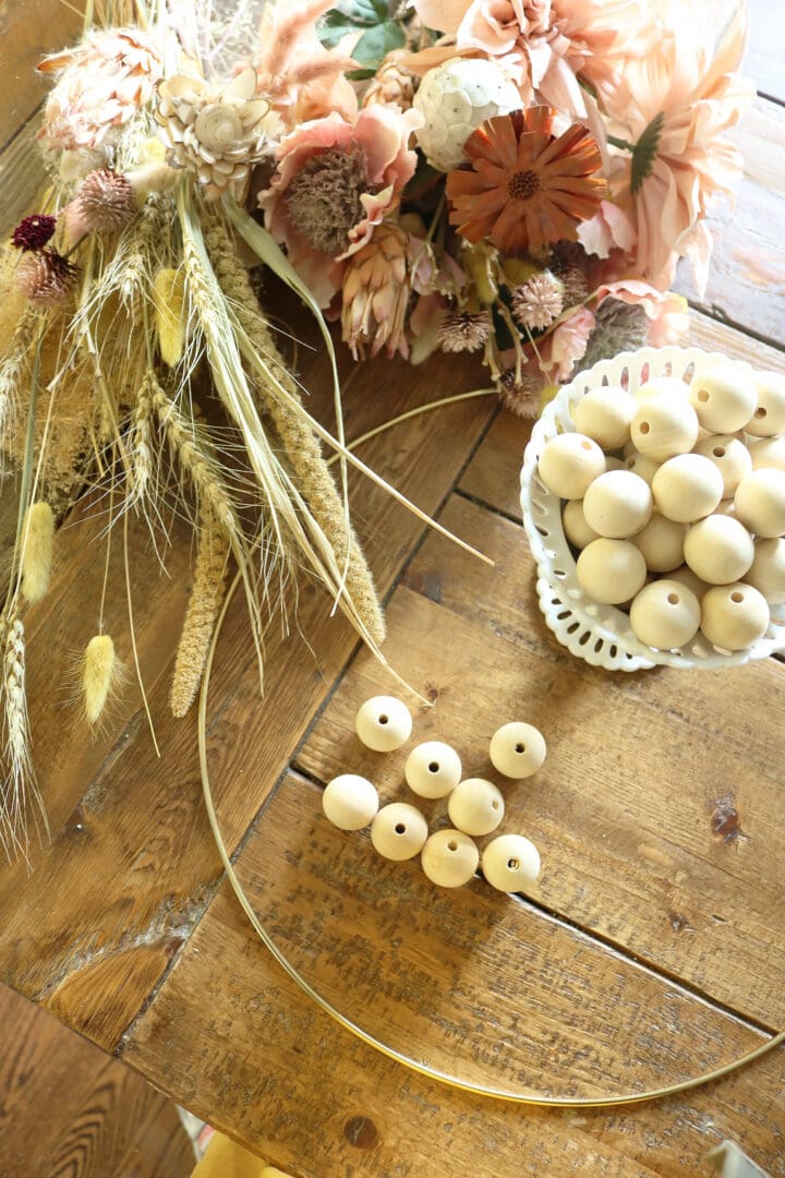 DIY Wooden Bead Fall Wreath with Dried and Faux Flowers for your front door or over a fireplace mantle.  The perfect Fall home decor || Darling Darleen Top CT Lifestyle Blogger