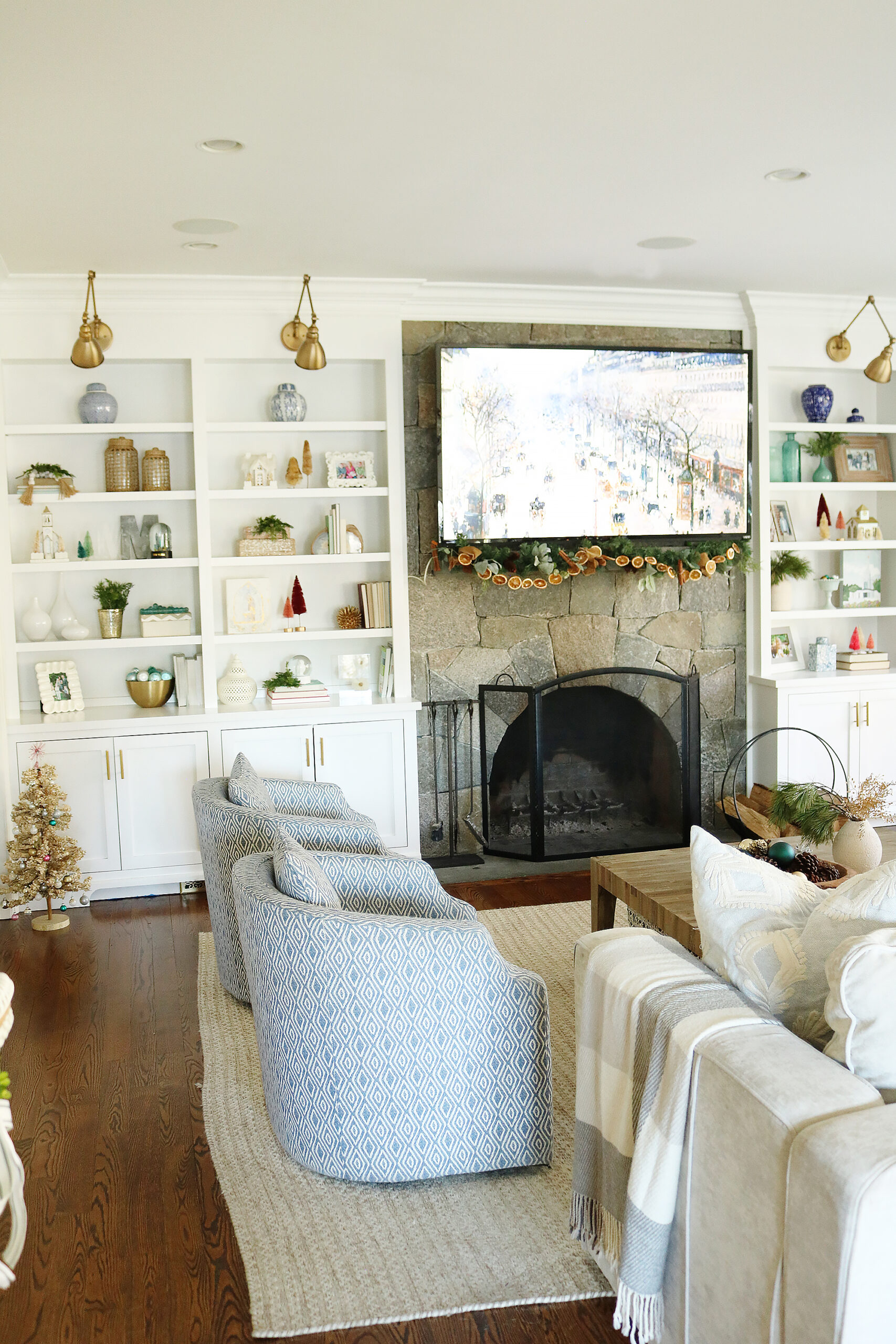 Holiday decorated bookshelves!  Switch Out a Few Items to Make Your Bookshelves More Festive for the Holidays and to match with your other decorations. || Darling Darleen Top CT Lifestyle Blogger 