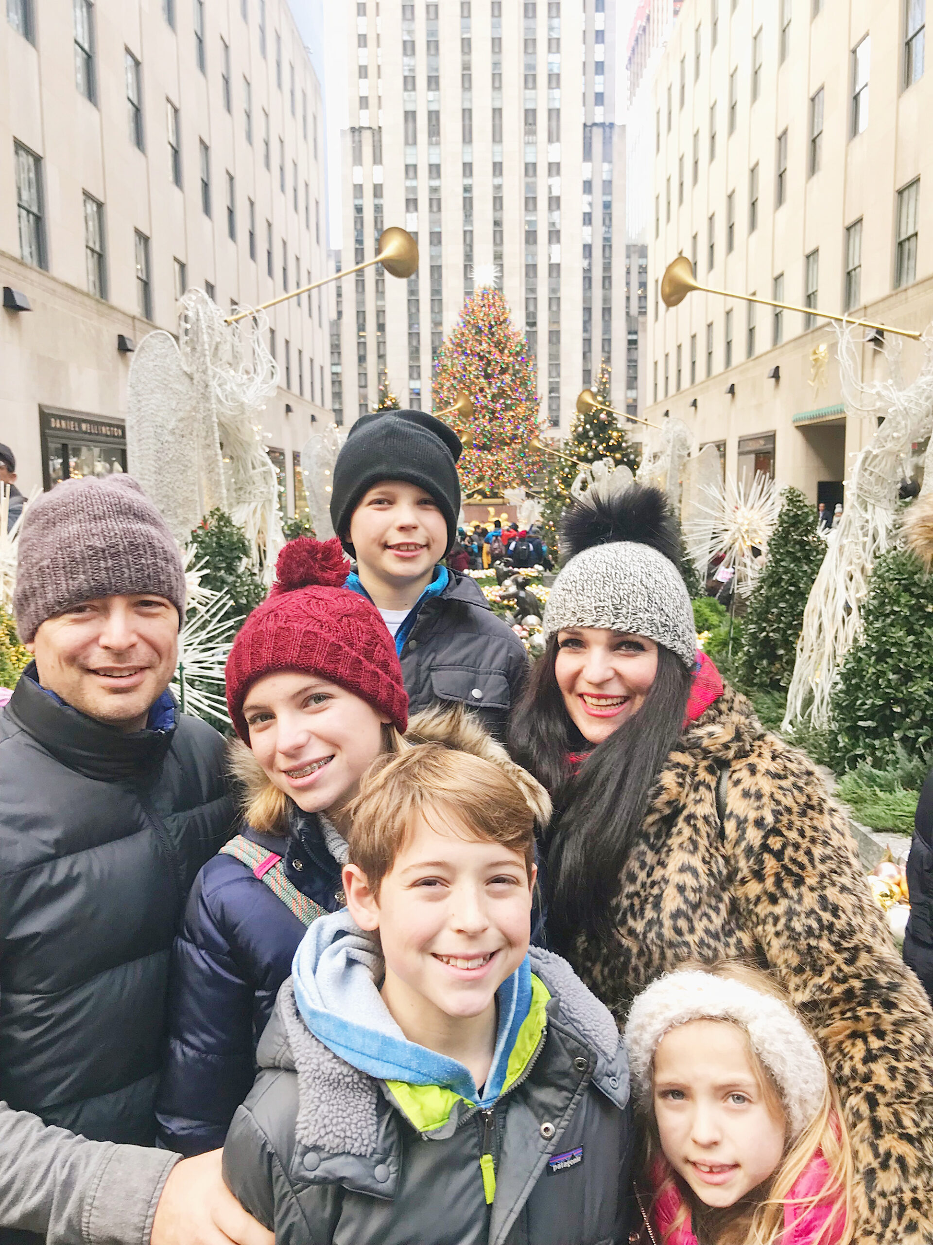 Christmas in New York City--Our Favorite Things to Do in New York City that will make your trip memorable, festive and of course magical! Rockefeller Tree Darling Darleen Top Lifestyle blogger